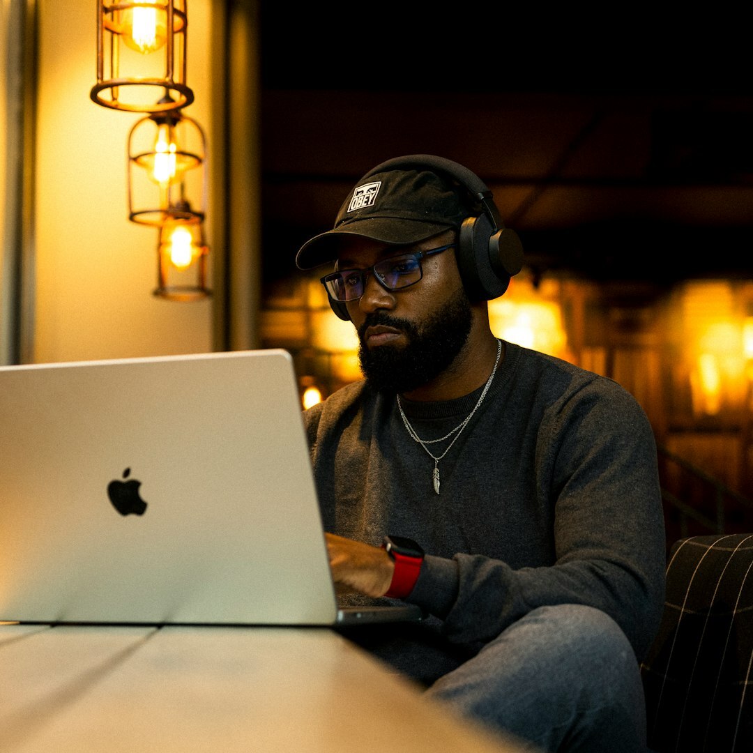 Production assistant with headset and clipboard at a live event