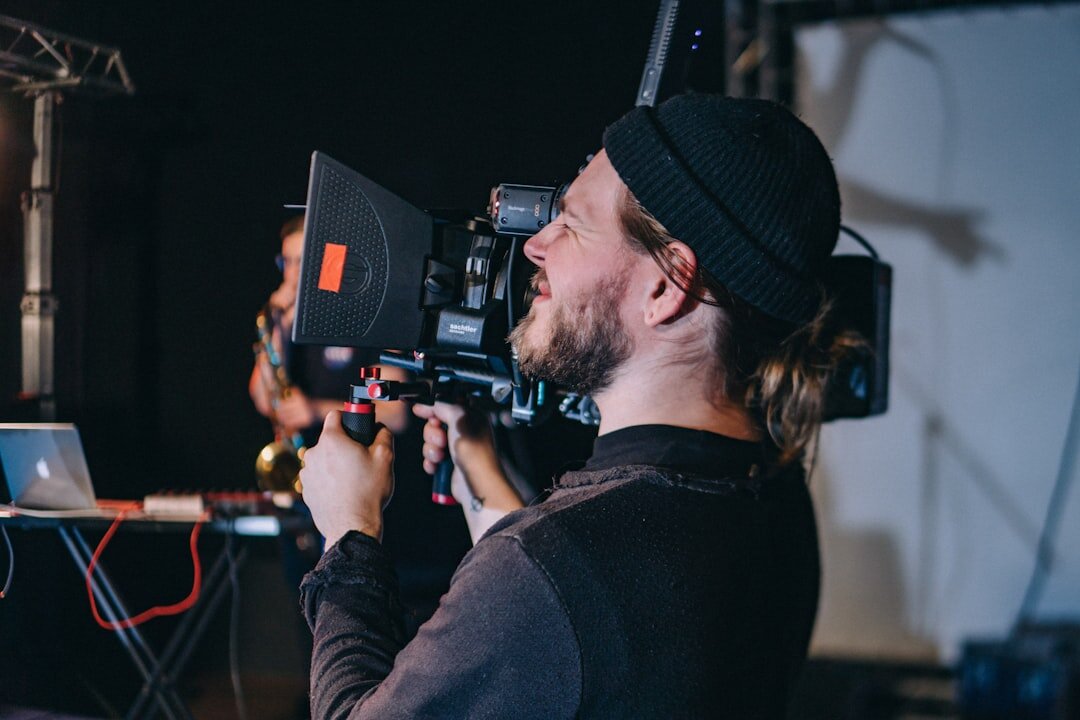 Camera operator working with a professional broadcast camera