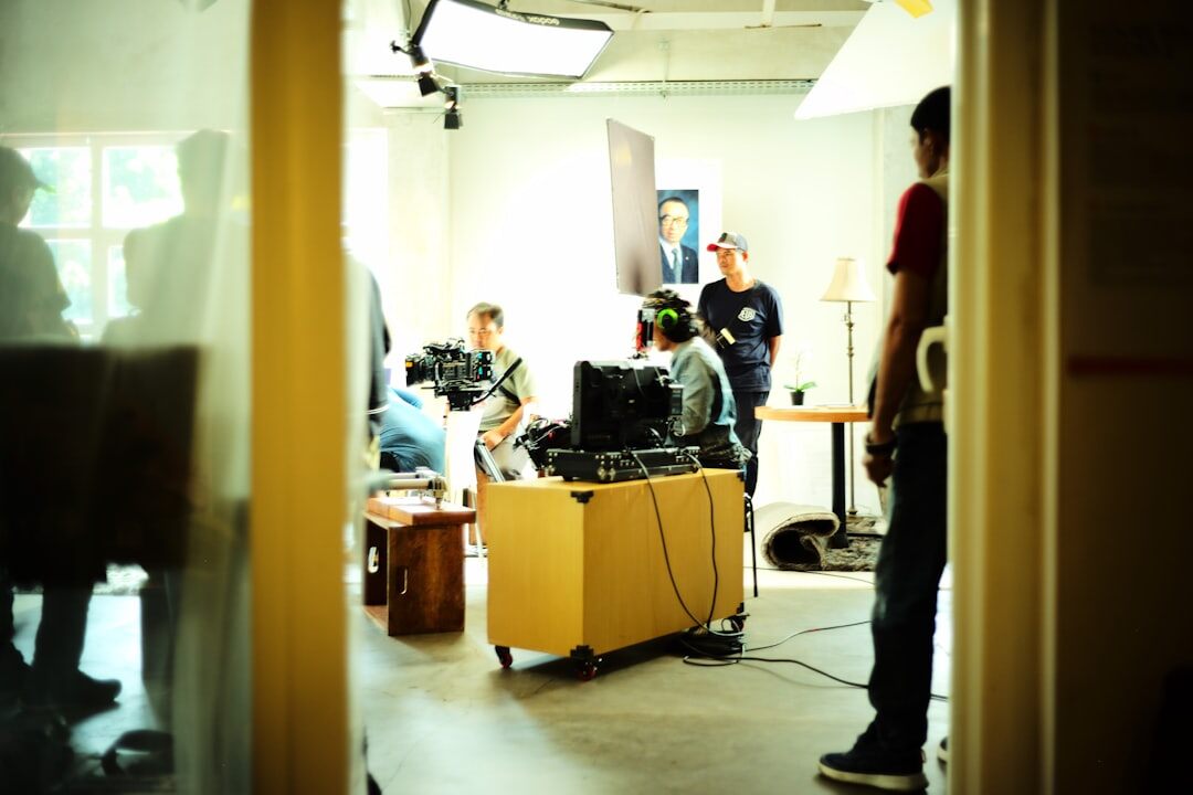 Diverse broadcast training team discussing production plans