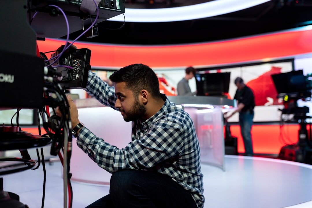 Training session in a broadcast studio for production crew