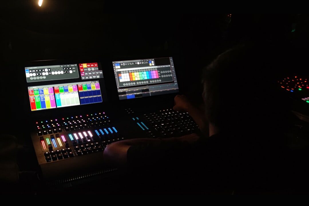 Live broadcast production setup with multiple screens and equipment